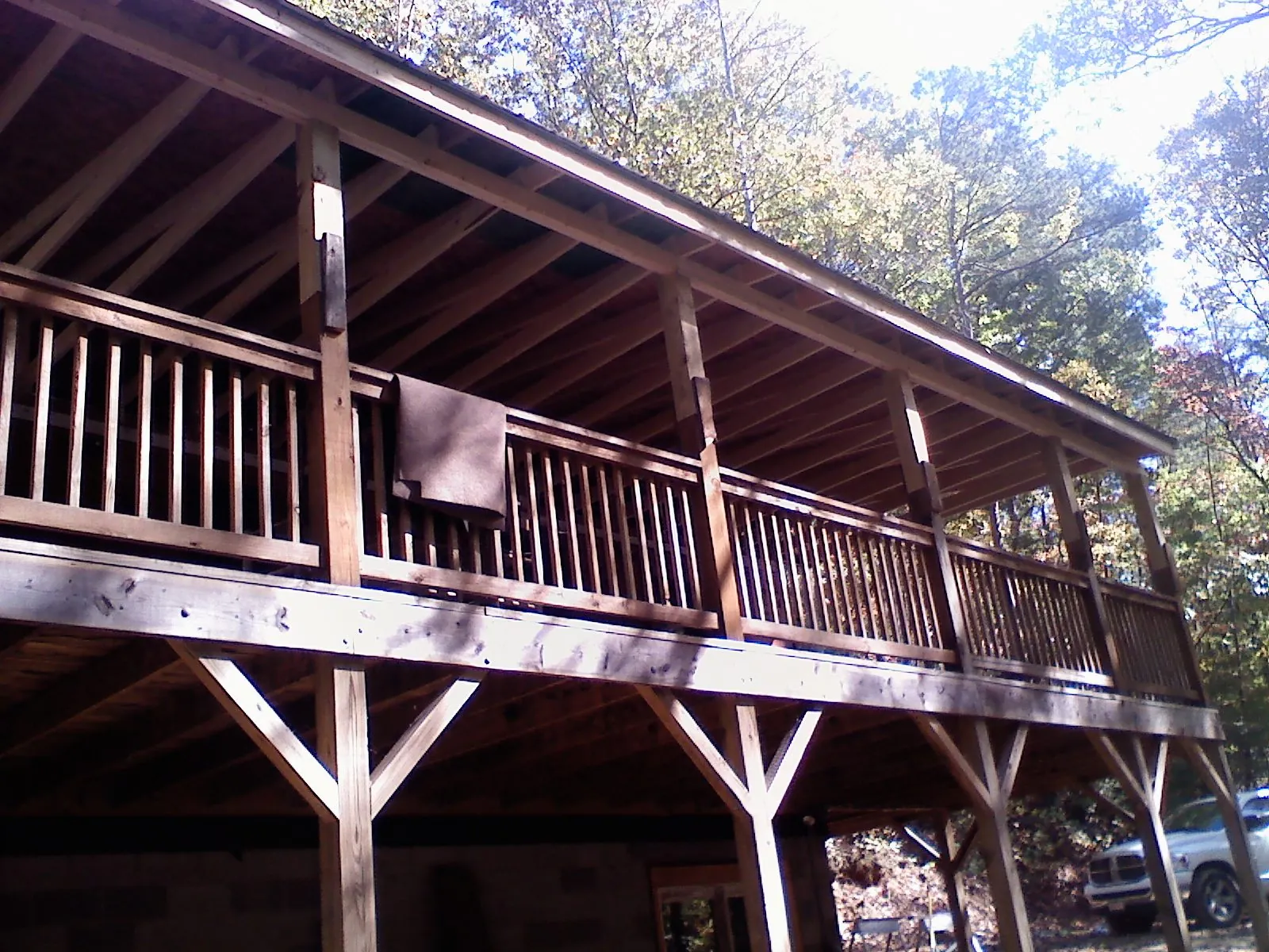 Timber framing under a new elevated porch and deck — Roof Leak Repair in Loon Lake by Roofing Brothers